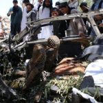 A suicide car bomber killed at least three intelligence officers