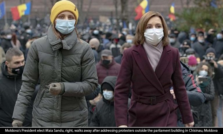 Thousands protest in front of Moldova Parliament