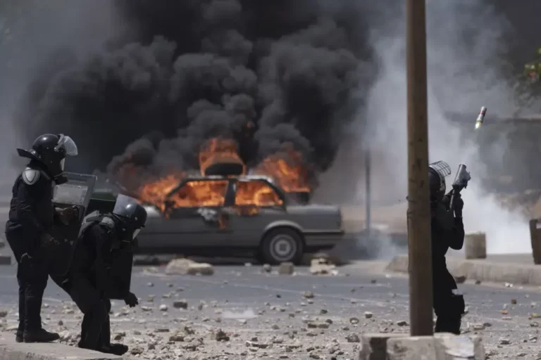 Clashes in Senegal leave at least 9 dead; government bans use of social media platforms