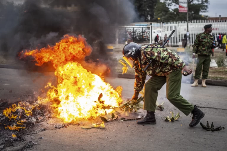 Activists in Kenya burn tires and block roads to protest taxes. Police detain more than 20 people