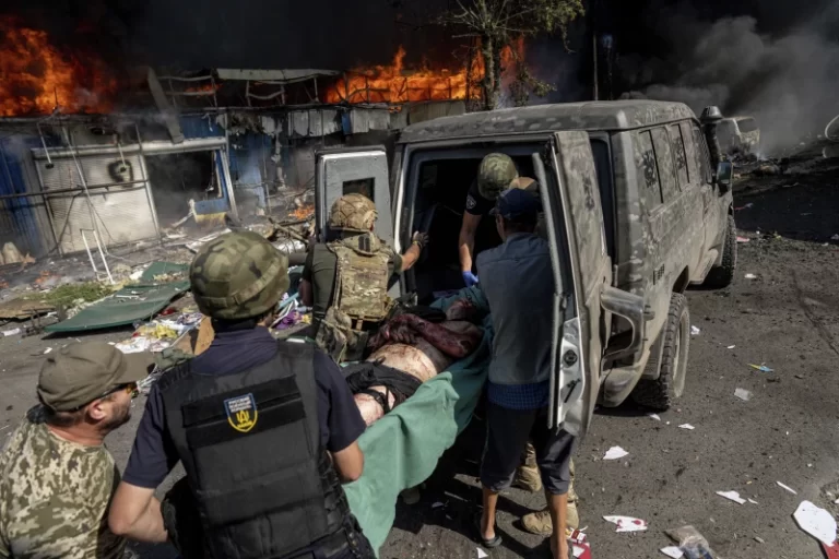 A Russian strike on a market in eastern Ukraine kills 17 and wounds dozens, officials say