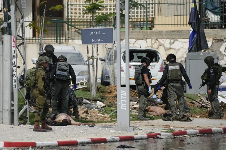 Israel battles Hamas for a second day after mass incursion and trades fire with Lebanon’s Hezbollah