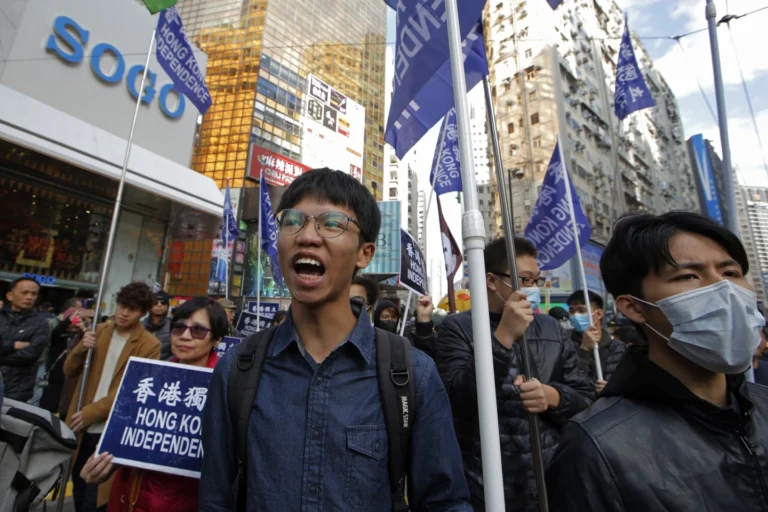 After serving jail term over security law, a Hong Kong pro-independence activist seeks asylum in UK