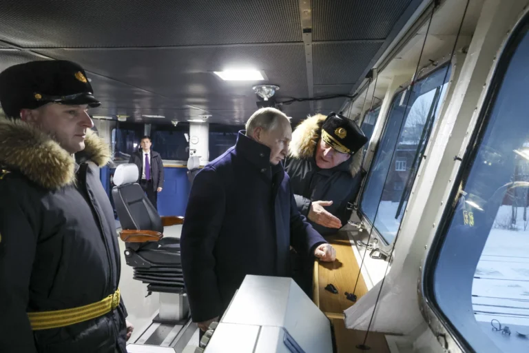Putin visits a shipyard to oversee the commissioning of new Russian nuclear submarines