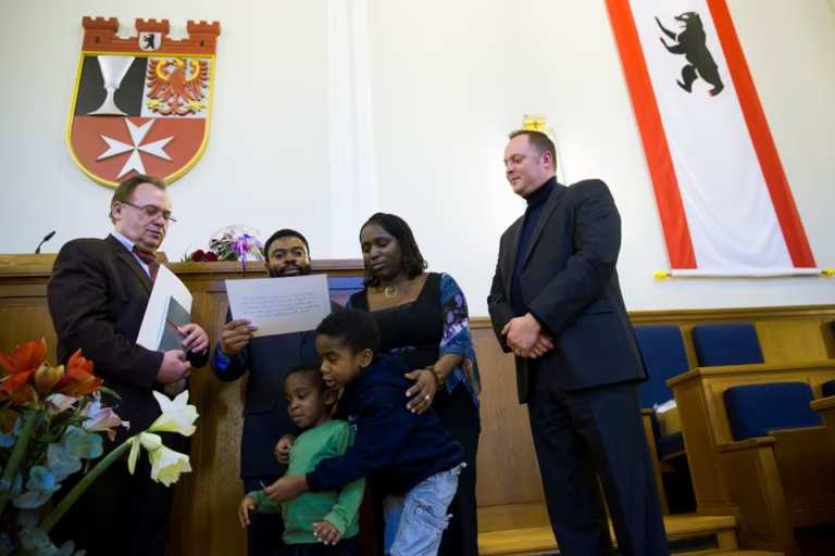 Labour-hungry Germany eases citizenship path despite migration rows