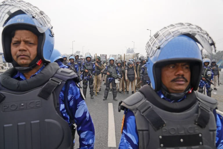 Police use tear gas against Indian farmers marching to New Delhi to demand guaranteed crop prices