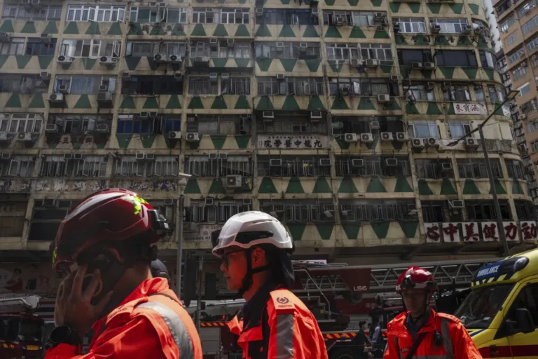 A fire in a 16-story Hong Kong residential building kills at least 5 people and injures dozens