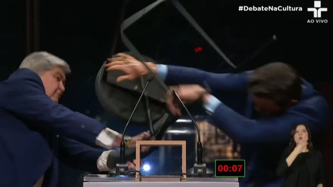 A Brazilian mayoral candidate hurled a chair at his opponent during a debate