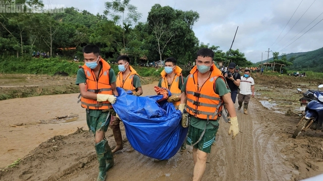 Vietnam typhoon death toll rises to 330 dead and missing as more bodies found in areas hit by landslides and floods