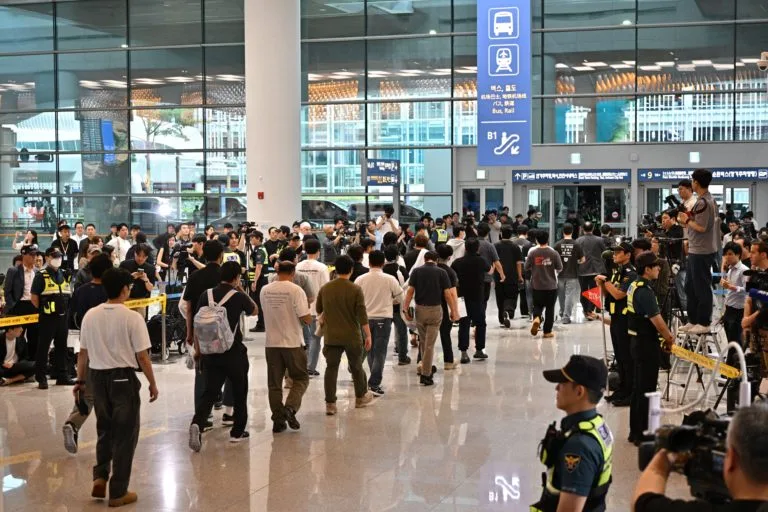 Over 300 South Korean workers return home after in detention following a U.S. immigration raid